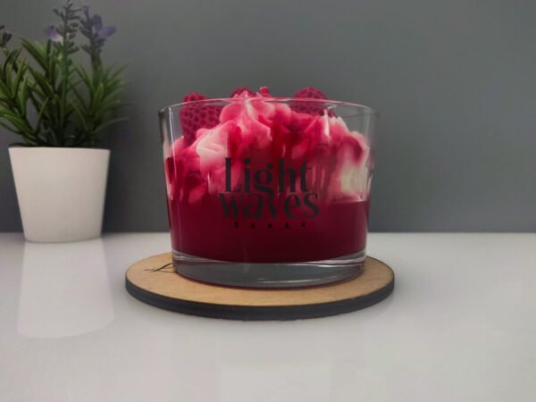 dessert soy candle with strawberries on a glass container